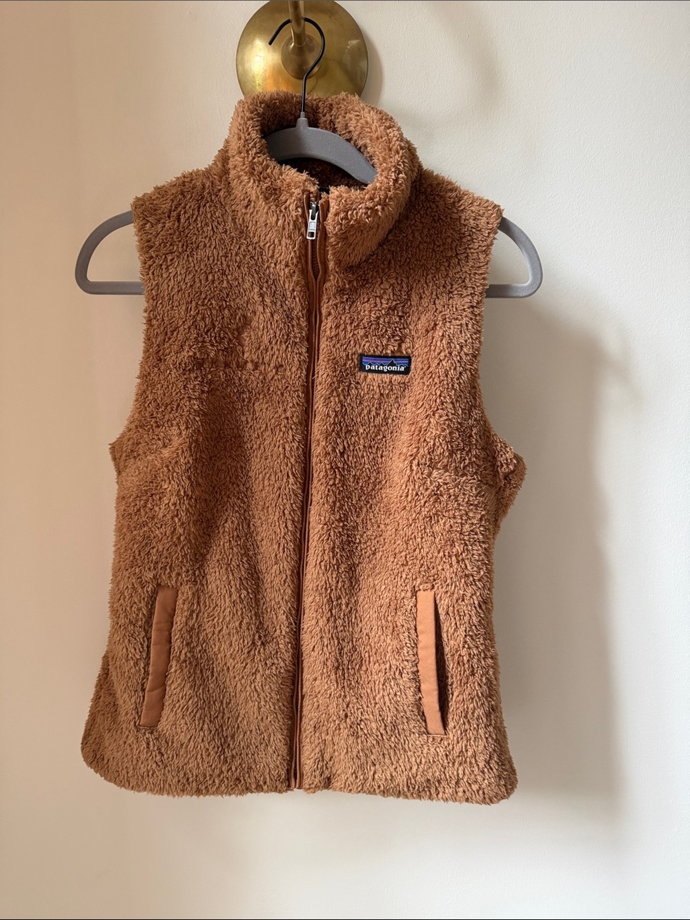 Patagonia Woman’s camel-colored Sherpa Fleece Vest